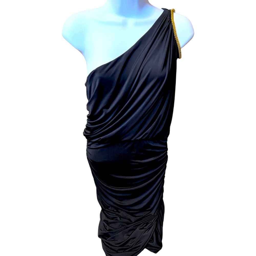 Fredricks black stretch cold shoulder fitted dress with gold bead accents.